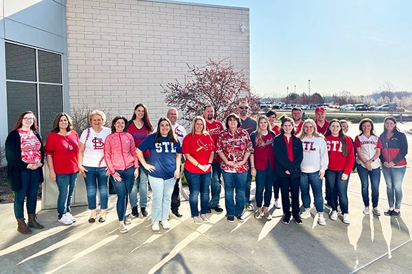 Wentzville employees posing in front of City Hall