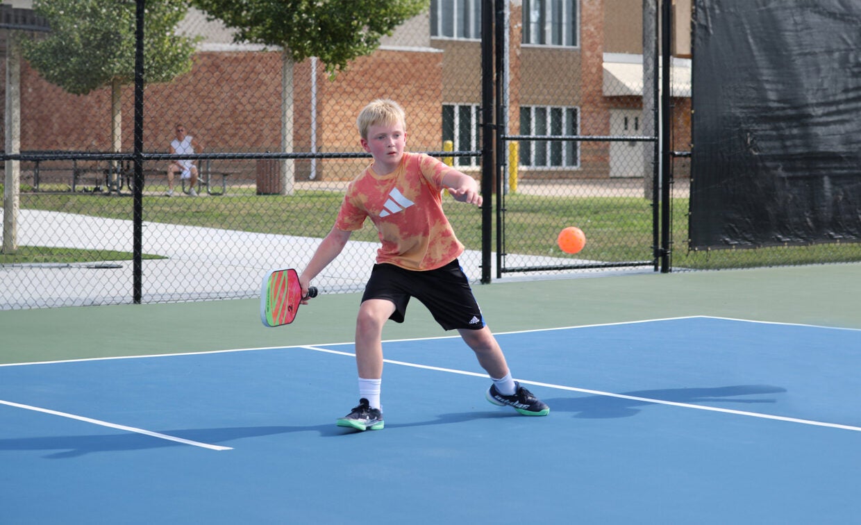 kids on tennis court
