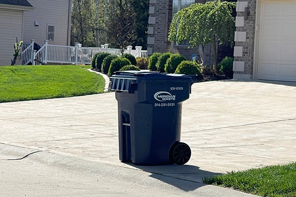 Trash bin in front of a house