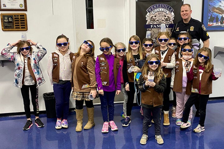 kids dressed up silly with police