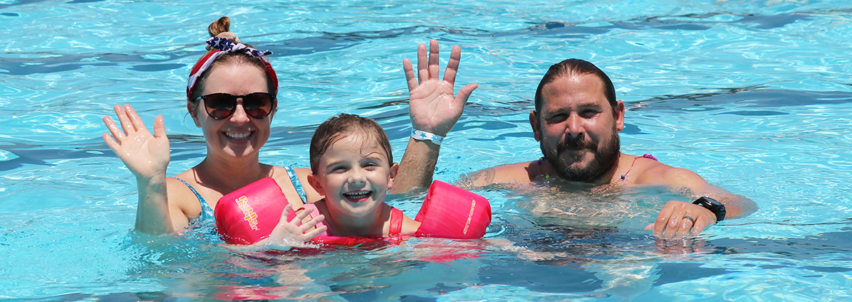 family at the pool