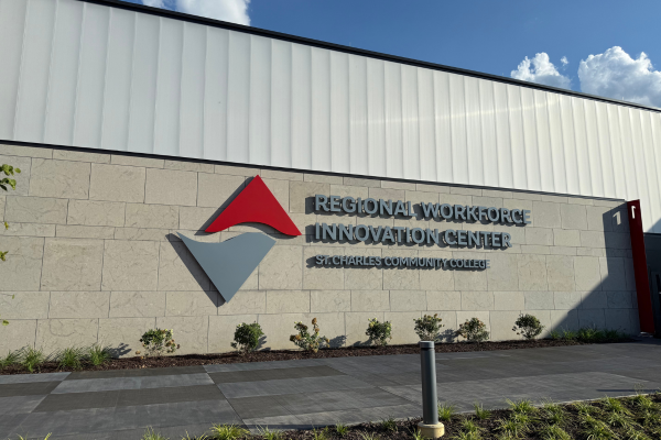 A homeowner uses a miter saw in his home for renovations